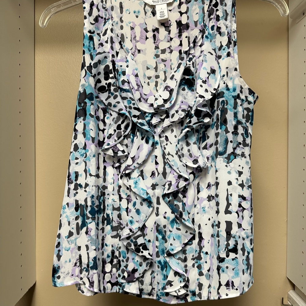 Ruffled White and Black Sleeveless Blouse with V-Neck